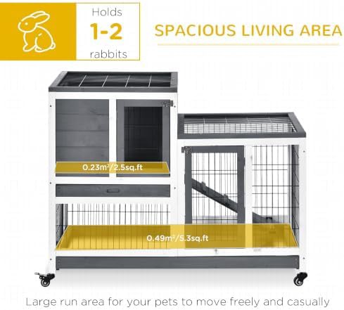 Elevated grey indoor hutch with wheels — photo 3