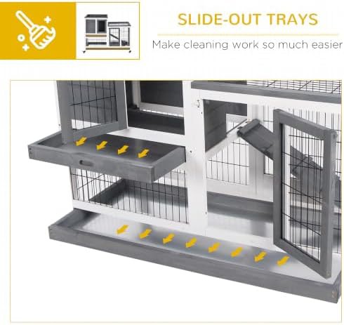 Elevated grey indoor hutch with wheels — photo 5