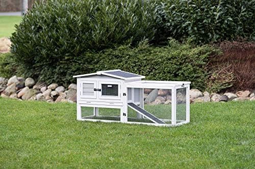 Insulated grey outdoor hutch for cold weather — photo 3