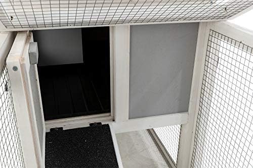 Insulated grey outdoor hutch for cold weather — photo 5