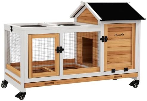 Yellow wooden rabbit hutch on wheels