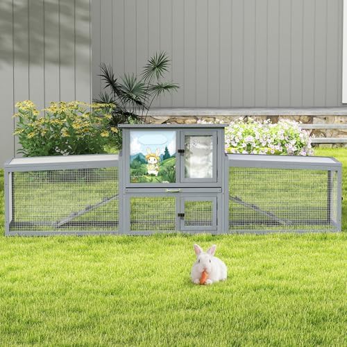 Large two level grey hutch with sloped roof — photo 4