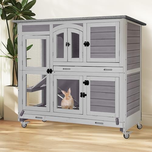 Grey two story hutch with asphalt roof