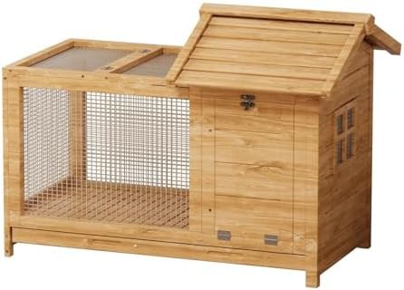 Wooden rabbit hutch with internal metal ramp